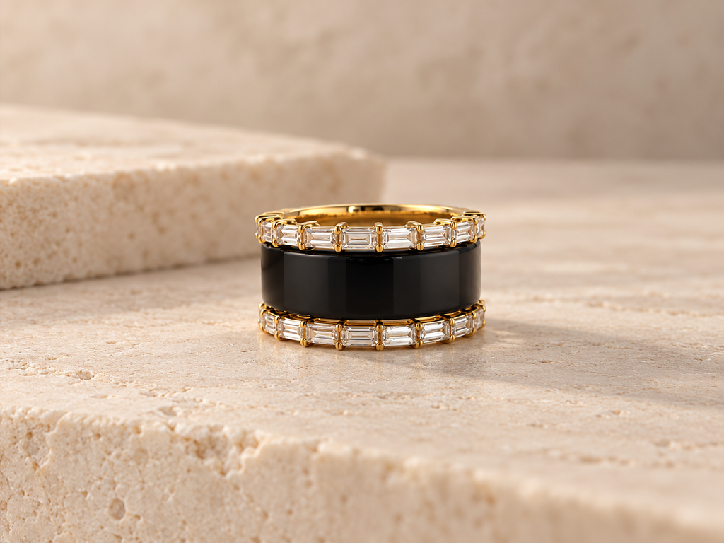 HALO Baguette in 14k yellow gold worn over a black Oura Ring