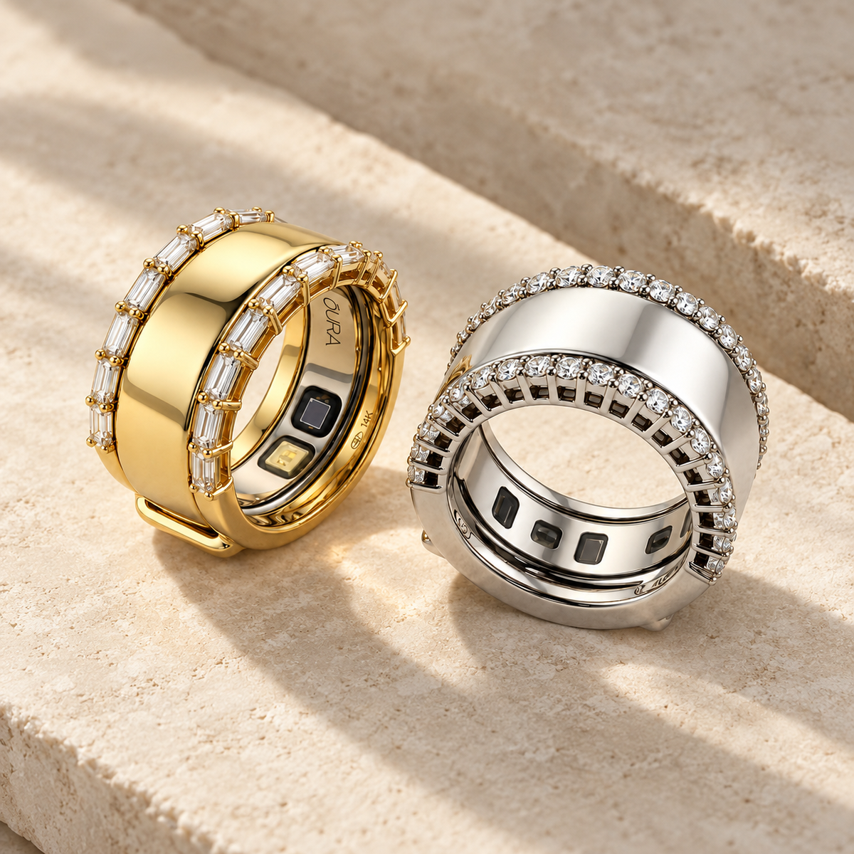 HALO Baguette in yellow gold and HALO Round in white gold over Oura Rings on travertine