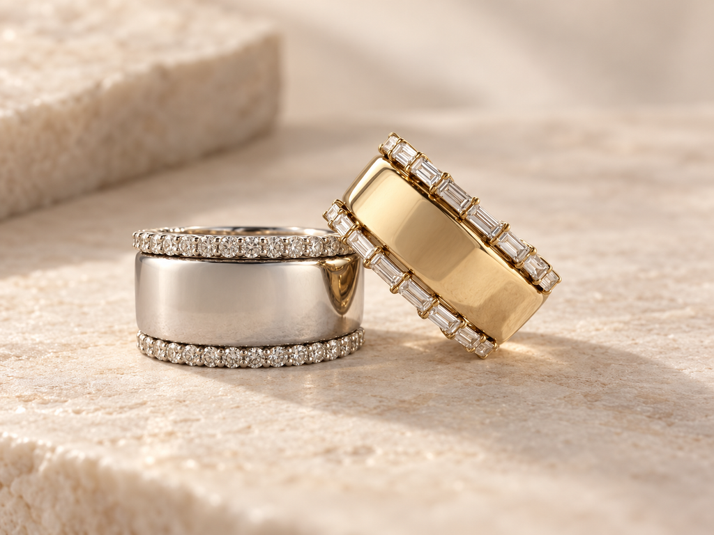 HALO Round in white gold and HALO Baguette in yellow gold, each worn over an Oura Ring